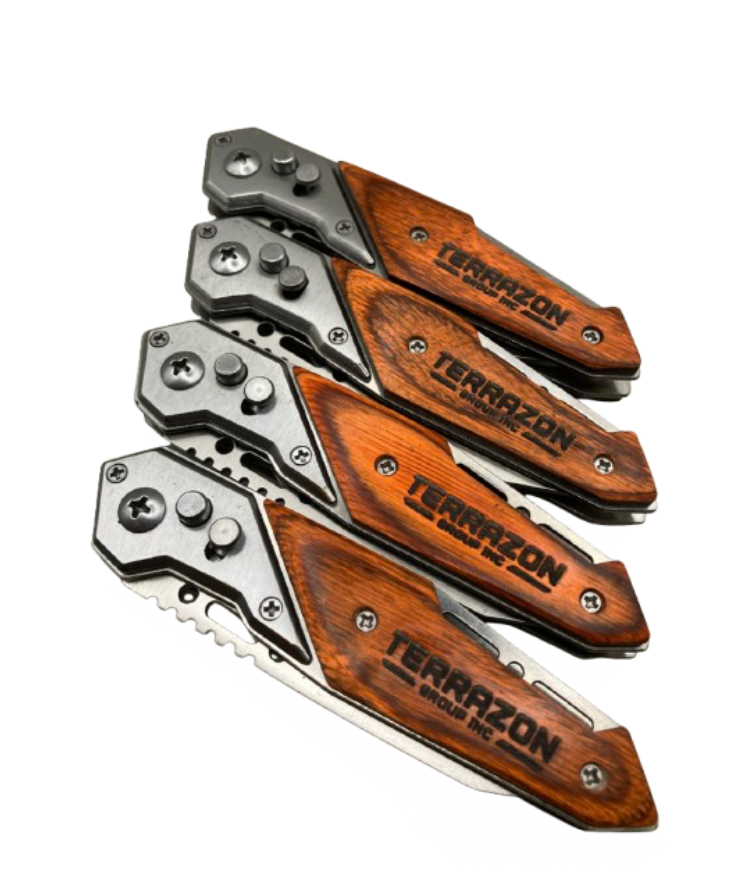 Four engraved knives with wood handle, shown closed, designed for a corporate bulk order. The handle features a custom engraving reading 'Terrazon' company logo on it.