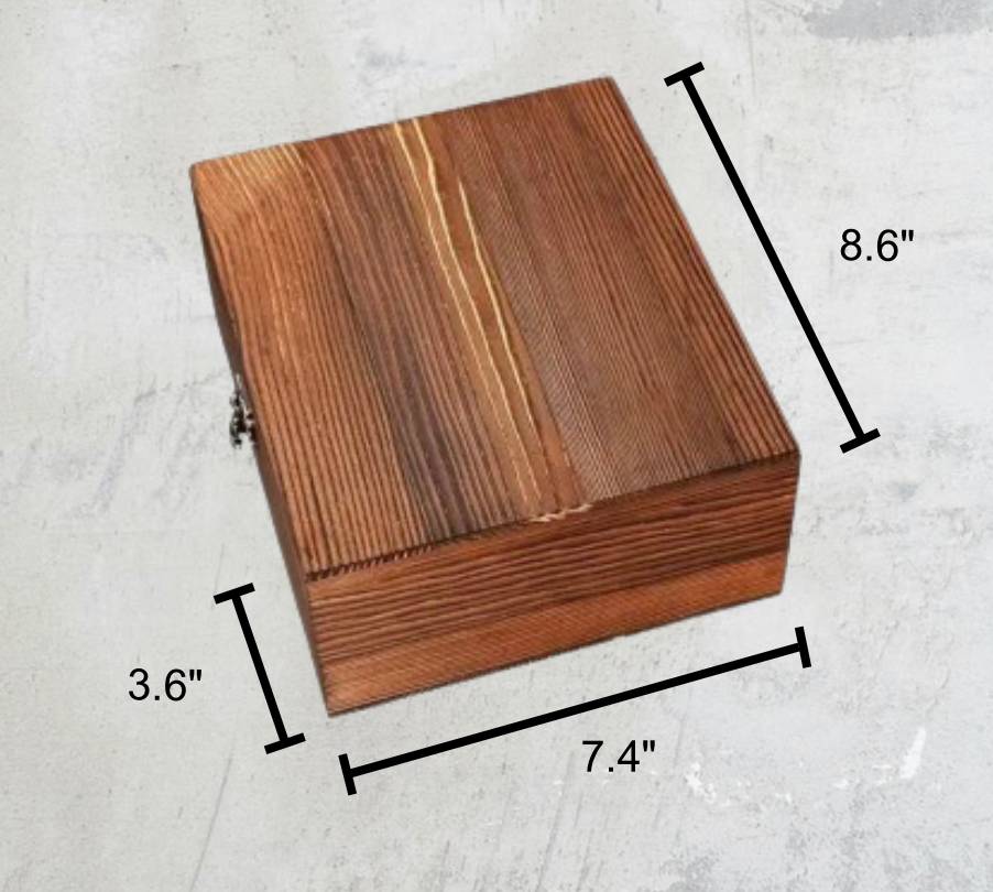 Dimensions of the Whiskey Lover's Deluxe Gift Set, including the engraved wooden box (7.4” x 8.6” x 3.6”) with ice stones, glasses, tongs, and coasters.