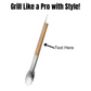 Stainless steel tongs with a wooden handle shown in a clean, modern setup, perfect for BBQs and outdoor cooking.