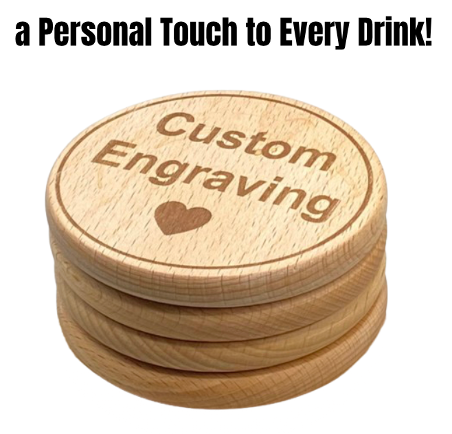 A set of four round wooden coasters with custom engraving, showcasing the text "Custom Engraving" with a heart design below, arranged neatly on a clean background.